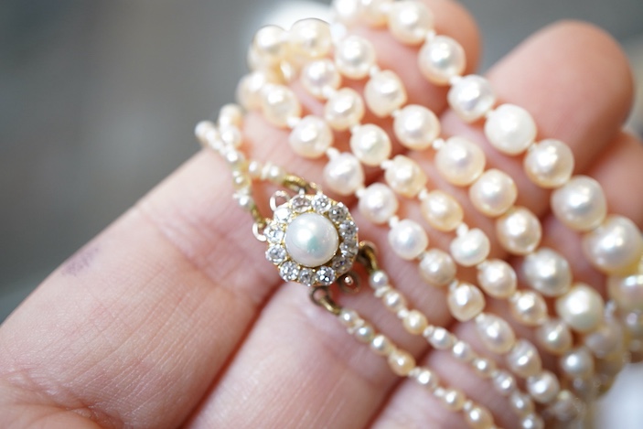 A natural pearl and diamond necklace, early 20th century